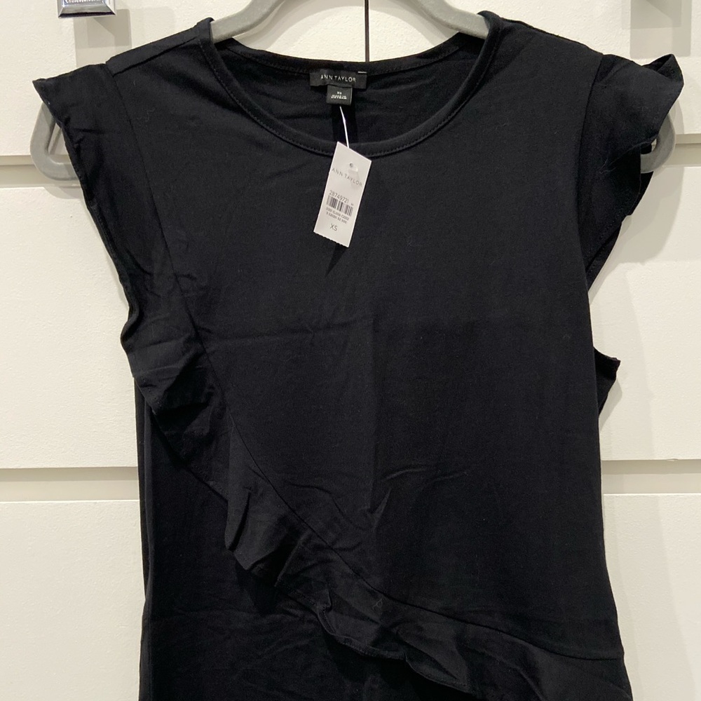 Ann Taylor ruffle sleeved blouse.